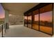 Large patio with mountain views, sleek railings, and sliding glass doors at 5000 N Camelback Ridge Dr # 301, Scottsdale, AZ 85251