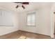 Simple bedroom with neutral walls and window coverings at 5331 E Virginia Ave, Phoenix, AZ 85008