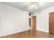 Bedroom with light walls and ceiling fan at 5331 E Virginia Ave, Phoenix, AZ 85008