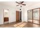 Bedroom with mirrored closet doors and access to bathroom at 5331 E Virginia Ave, Phoenix, AZ 85008