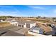 Aerial view of a house with a large driveway and detached garage at 6105 N 174Th Ave, Waddell, AZ 85355