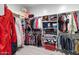 Large walk-in closet with ample shelving and hanging space at 6105 N 174Th Ave, Waddell, AZ 85355