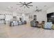 Open concept kitchen boasts a large island, modern cabinetry, and spacious layout at 6105 N 174Th Ave, Waddell, AZ 85355