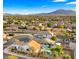 Neighborhood view showcasing a home and pool at 6268 S Martingale Ct, Gilbert, AZ 85298