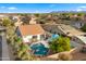 Property with pool, landscaping, and mountain views at 6268 S Martingale Ct, Gilbert, AZ 85298