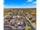 Aerial view of a house and neighborhood, showcasing the property's location and surrounding area at 6268 S Martingale Ct, Gilbert, AZ 85298