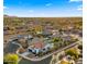 Neighborhood view with home, pool, and mountain views at 6268 S Martingale Ct, Gilbert, AZ 85298