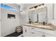 Spa-like bathroom with double vanity, walk-in shower, and hexagon tile flooring at 6268 S Martingale Ct, Gilbert, AZ 85298