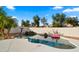 Inviting kidney shaped pool with waterfall feature in a private backyard setting at 6268 S Martingale Ct, Gilbert, AZ 85298