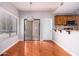 Dining area with hardwood floors and access to patio at 7101 W Beardsley Rd # 942, Glendale, AZ 85308