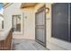 Front porch of home with secured entry and a view to the outside at 7101 W Beardsley Rd # 942, Glendale, AZ 85308