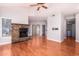 Living room features hardwood floors and a stone fireplace at 7101 W Beardsley Rd # 942, Glendale, AZ 85308