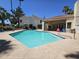 Community pool with lounge chairs and patio seating at 7101 W Beardsley Rd # 942, Glendale, AZ 85308