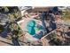 Overhead view of the unique kidney shaped pool and surrounding landscape at 7957 E Cave Creek Rd, Carefree, AZ 85377