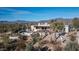 Beautiful aerial view of a sprawling Southwestern home and landscape at 7957 E Cave Creek Rd, Carefree, AZ 85377