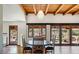 Dining room with hardwood floors and access to the patio at 7957 E Cave Creek Rd, Carefree, AZ 85377