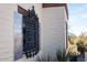 Close-up of a window with tile accents and decorative ironwork at 7957 E Cave Creek Rd, Carefree, AZ 85377