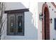 Close-up of a window with stained glass and decorative ironwork at 7957 E Cave Creek Rd, Carefree, AZ 85377