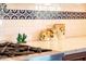 Countertop detail with decorative canisters and cactus at 7957 E Cave Creek Rd, Carefree, AZ 85377