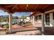 Spacious patio with seating and pool views at 7957 E Cave Creek Rd, Carefree, AZ 85377