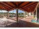 Covered patio with seating and mountain views at 7957 E Cave Creek Rd, Carefree, AZ 85377