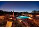 Scenic pool and patio area with desert landscape views at 7957 E Cave Creek Rd, Carefree, AZ 85377