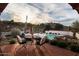 Relaxing pool area with patio furniture and mountain views at 7957 E Cave Creek Rd, Carefree, AZ 85377