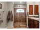 Spa-like bathroom featuring a walk-in shower and updated vanity at 8137 N 13Th Pl, Phoenix, AZ 85020