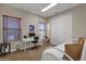 Cozy bedroom with a daybed, desk, and plenty of natural light at 8137 N 13Th Pl, Phoenix, AZ 85020