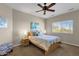 Bright bedroom with ceiling fan and neutral decor at 8137 N 13Th Pl, Phoenix, AZ 85020