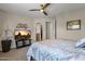 Serene bedroom with ensuite bathroom access and a TV at 8137 N 13Th Pl, Phoenix, AZ 85020