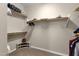 Large walk-in closet with ample shelving and hanging space at 8137 N 13Th Pl, Phoenix, AZ 85020