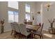 Formal dining room with a wood table and neutral-toned chairs at 8137 N 13Th Pl, Phoenix, AZ 85020