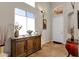 Bright and airy entryway with a wooden console table at 8137 N 13Th Pl, Phoenix, AZ 85020