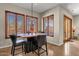 Kitchen breakfast nook with wood cabinets and large windows at 8137 N 13Th Pl, Phoenix, AZ 85020