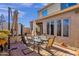 Relaxing patio with seating area, umbrella, and adjacent hot tub at 8137 N 13Th Pl, Phoenix, AZ 85020