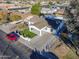 House and surrounding neighborhood shown in an aerial view at 8230 W Monterey Way, Phoenix, AZ 85033