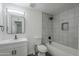 Clean bathroom, featuring a shower/tub combo and modern vanity at 8230 W Monterey Way, Phoenix, AZ 85033