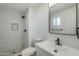 Updated bathroom with a walk-in shower and new fixtures at 8230 W Monterey Way, Phoenix, AZ 85033