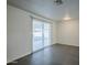 Bright dining area with sliding glass doors leading to the backyard at 8230 W Monterey Way, Phoenix, AZ 85033