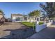 Nice curb appeal with gravel driveway and front yard at 8230 W Monterey Way, Phoenix, AZ 85033