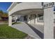 Updated front entry featuring a covered porch and security door at 8230 W Monterey Way, Phoenix, AZ 85033