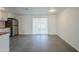 Kitchen with white cabinets, butcher block countertops, and stainless steel appliances at 8230 W Monterey Way, Phoenix, AZ 85033