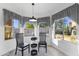 Breakfast nook with black chairs and window seating at 8383 W Utopia N Rd, Peoria, AZ 85382