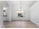 Bright dining room with hardwood floors and a chandelier at 8383 W Utopia N Rd, Peoria, AZ 85382