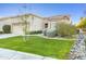 House exterior showing front entrance and landscaping at 8383 W Utopia N Rd, Peoria, AZ 85382