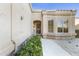 House exterior with walkway and well-maintained landscaping at 8383 W Utopia N Rd, Peoria, AZ 85382