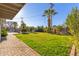 Landscaped backyard with grassy lawn at 8435 E Catalina Dr, Scottsdale, AZ 85251