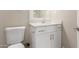 Clean bathroom with white vanity, toilet and modern fixtures at 8435 E Catalina Dr, Scottsdale, AZ 85251