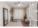 Bright exercise room with mirror, equipment, and wood-look floors at 8435 E Catalina Dr, Scottsdale, AZ 85251